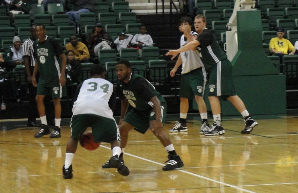 EMU men's basketball green versus white