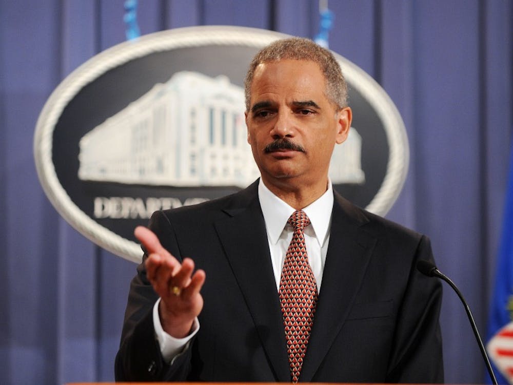 U.S. Attorney General Eric Holder announces that the self-described mastermind of the 9/11 attacks, Khalid Shaikh Mohammad, and four other Guantanamo detainees accused in the plot will be tried in federal court in New York during a news conference at the Department of Justice November 13, 2009 in Washington, DC. (Olivier Douliery/Abaca Press/MCT)
