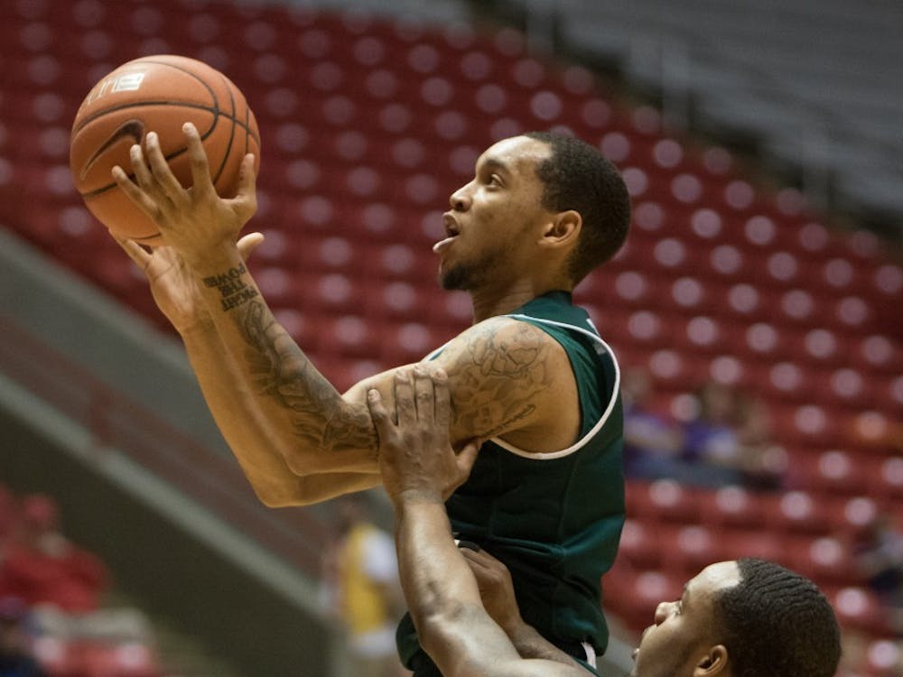 Eastern Michigan guard Mike Talley drives to the basket in the Eagles 67-60 win over Ball State March 3 2015 in Muncie, Ind.