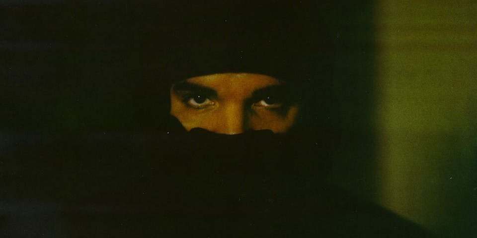 Drake dons a mask moving in a dark lane to new music. Credit: Hypebae