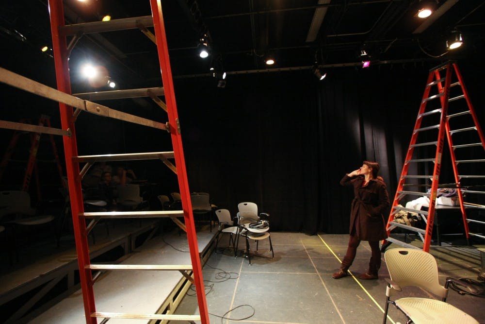 The entire staff of the production worked together to get the show up and running for viewing, here staff is seen setting up the lights and doing checking to see if the light positioning is correct.
