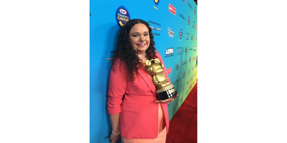 Brittney Barros with the Heroes for Change award