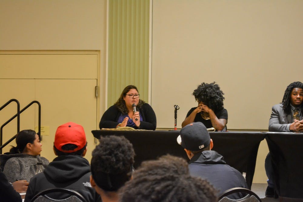 EMU student panelist Michelle Lietz speaks about prejudices regarding her Native American heritage during the Institutional Racism in Higher Education Forum on Nov. 19, 2015 in the Mckenny Hall  Ballroom.