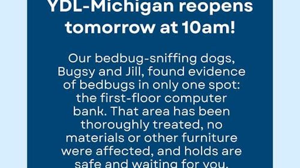 A flyer announces the reopening of the YDL Michigan Avenue branch.