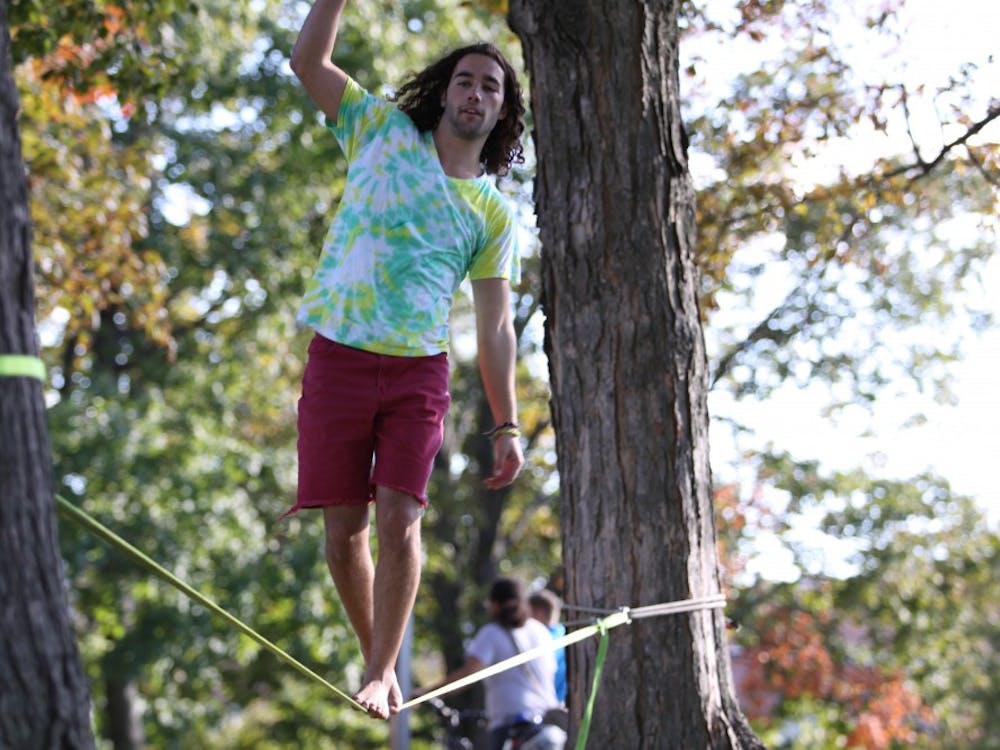 	Junior Joe Morris has been slack lining around campus since he discovered the sport his freshman year. The 20-year-old Morris reminds us that slack lining is not the same as tight rope walking. Unlike, tight rope walkers, slack liners balance on a rope that moves, which Morris said “makes it much harder.”