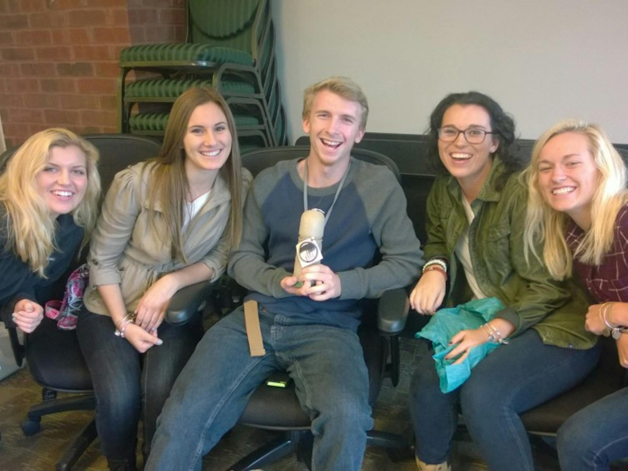 The winning group won a candle in the shape of the Water Tower. From right to left: Erin Beyer, Alyssa Licavoli, Rob Cottrell, Adrianna Sputa and Kate Mueller.
