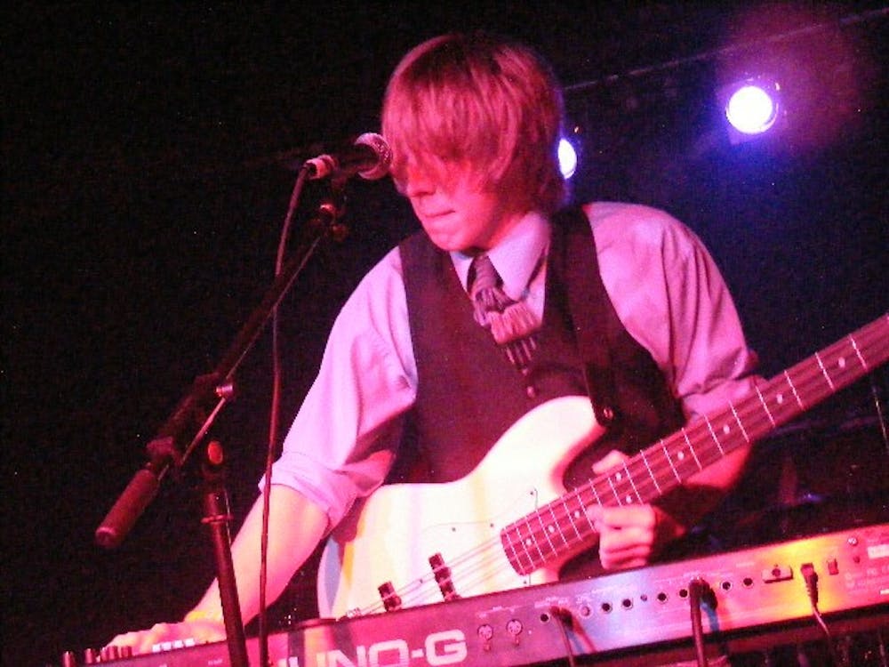EMU student Chris Smith of The Ultrasounds playing bass and keyboard last Saturday at the Blind Pig in Ann Arbor.