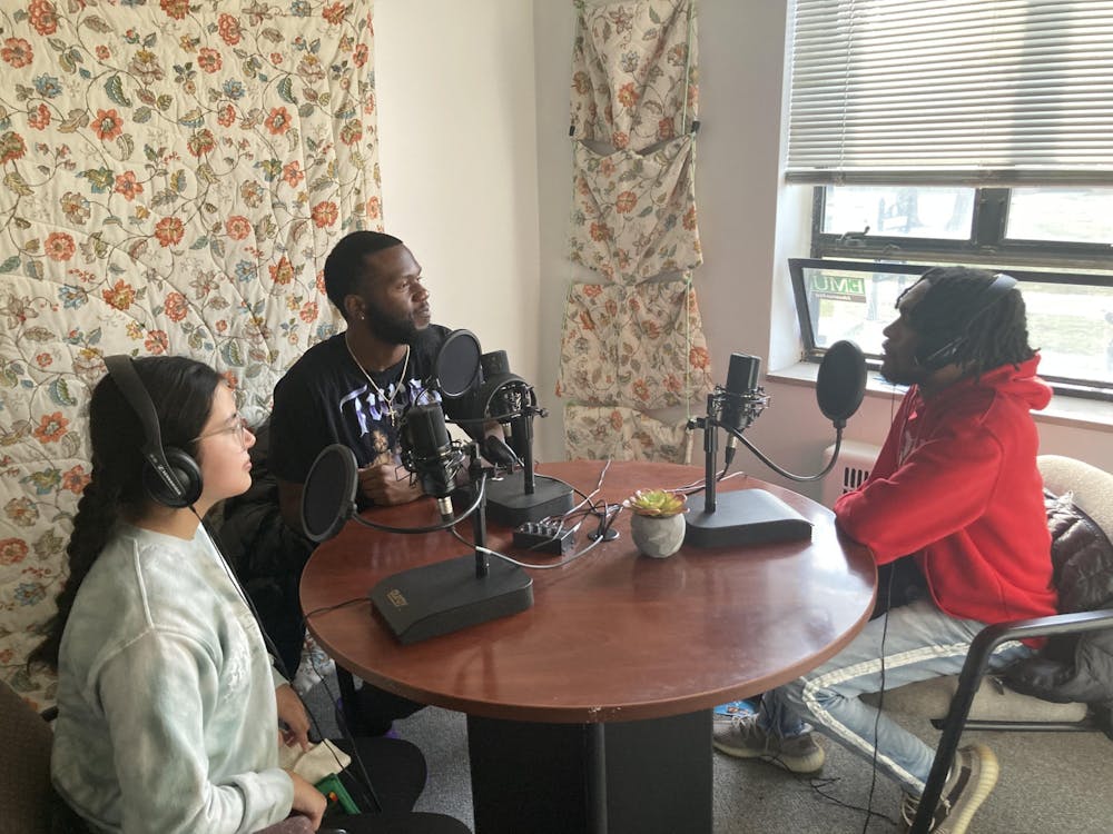 Echo Podcast hosts Sarai Yanes, left, and Qu﻿eso Tone, center, discuss Black History Month with Kings of Color President Dylan Hughey. Kings of Color is a student organization that focuses on building connections within communities of color.