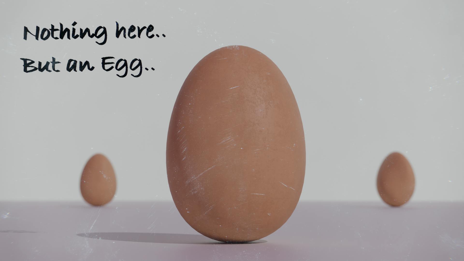 Graphic of 3 brown eggs sitting upright in an empty space, with 1 in the foreground and 2 in the background. Text over the image reads "Nothing here... but an egg..."