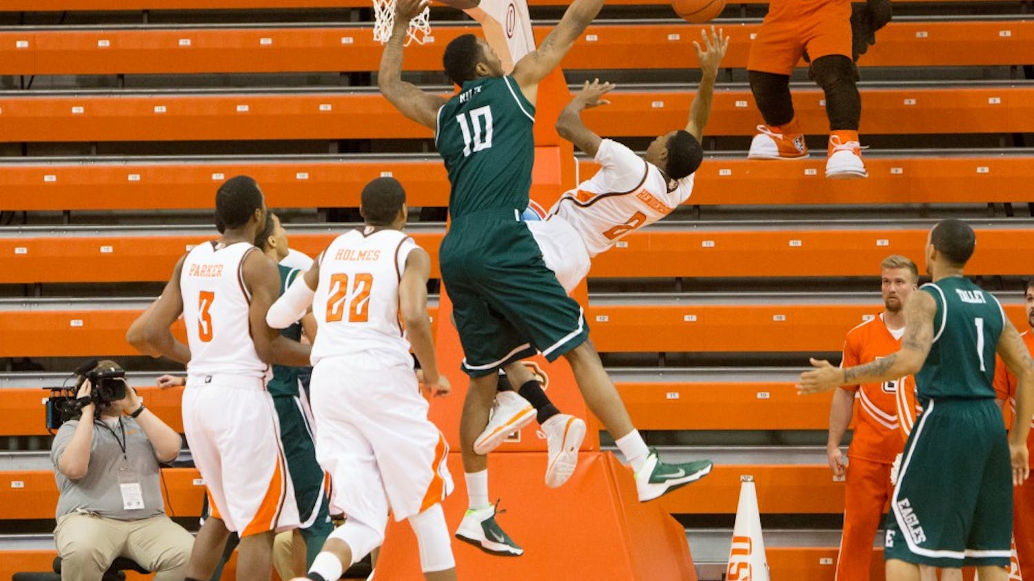 EMU center Da'Shonte Riley collects one of his three blocks in Eastern Michigan's 56-51 win over Bowling Green Wednesday night.