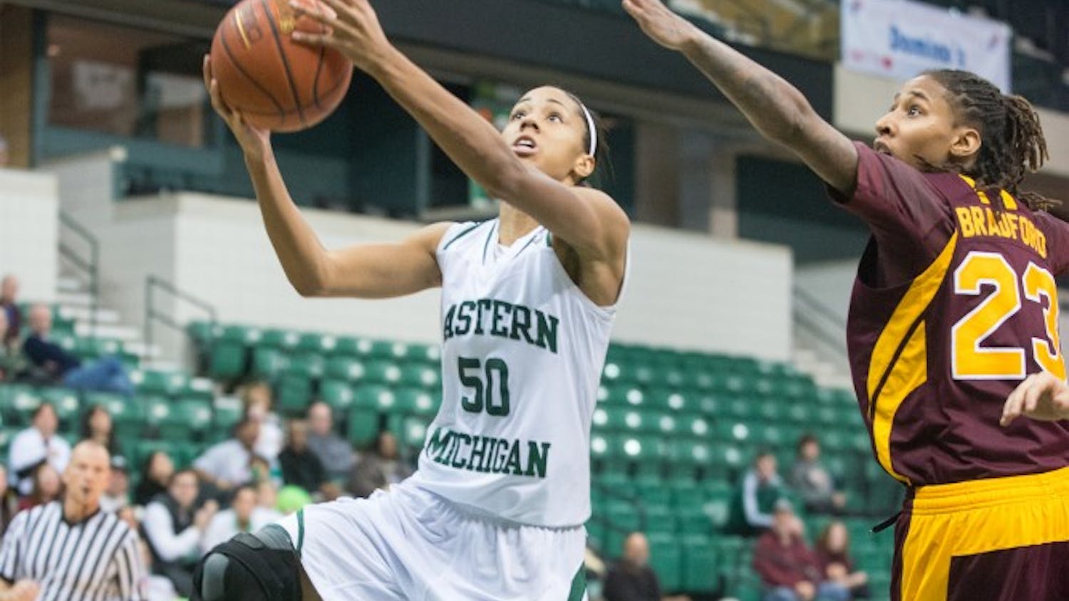 Eastern Michigan's Natachia Watkins beats the defense and scores during the Eagle's 99-83 Senior-Day win over Central Michigan on 8 March at the Convocation Center.