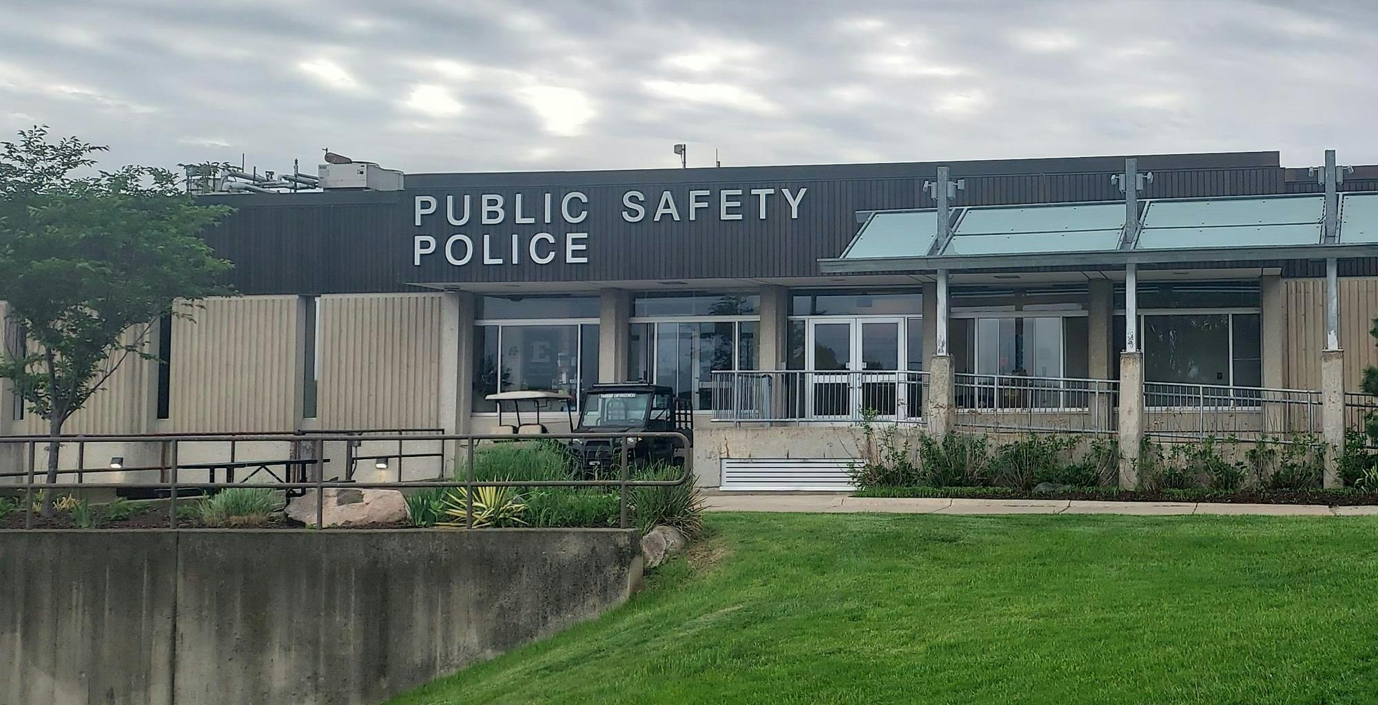 A black and tan building with the words "Public Safety Police" on the front. 
