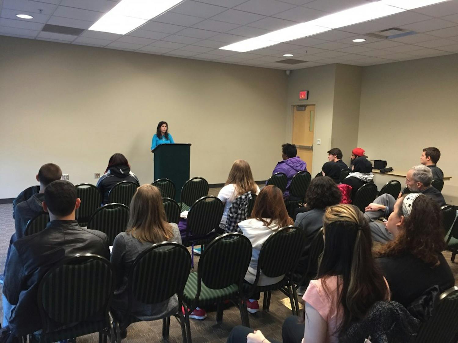 Zeina Hamade spoke to students about Syrian refugees moving&nbsp;into&nbsp;Southeast Michigan.