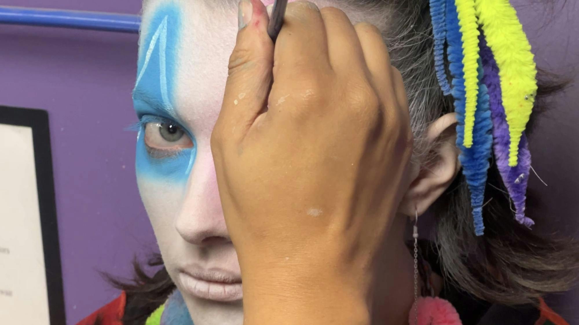 Professional scare actors at Wiard's Orchards prepare for a night of terror