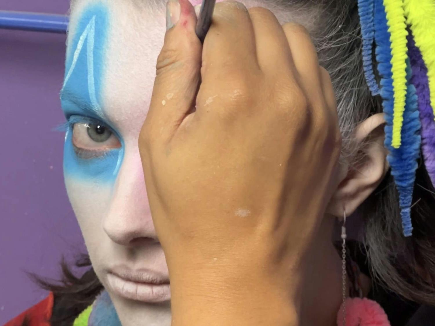 Professional scare actors at Wiard's Orchards prepare for a night of terror