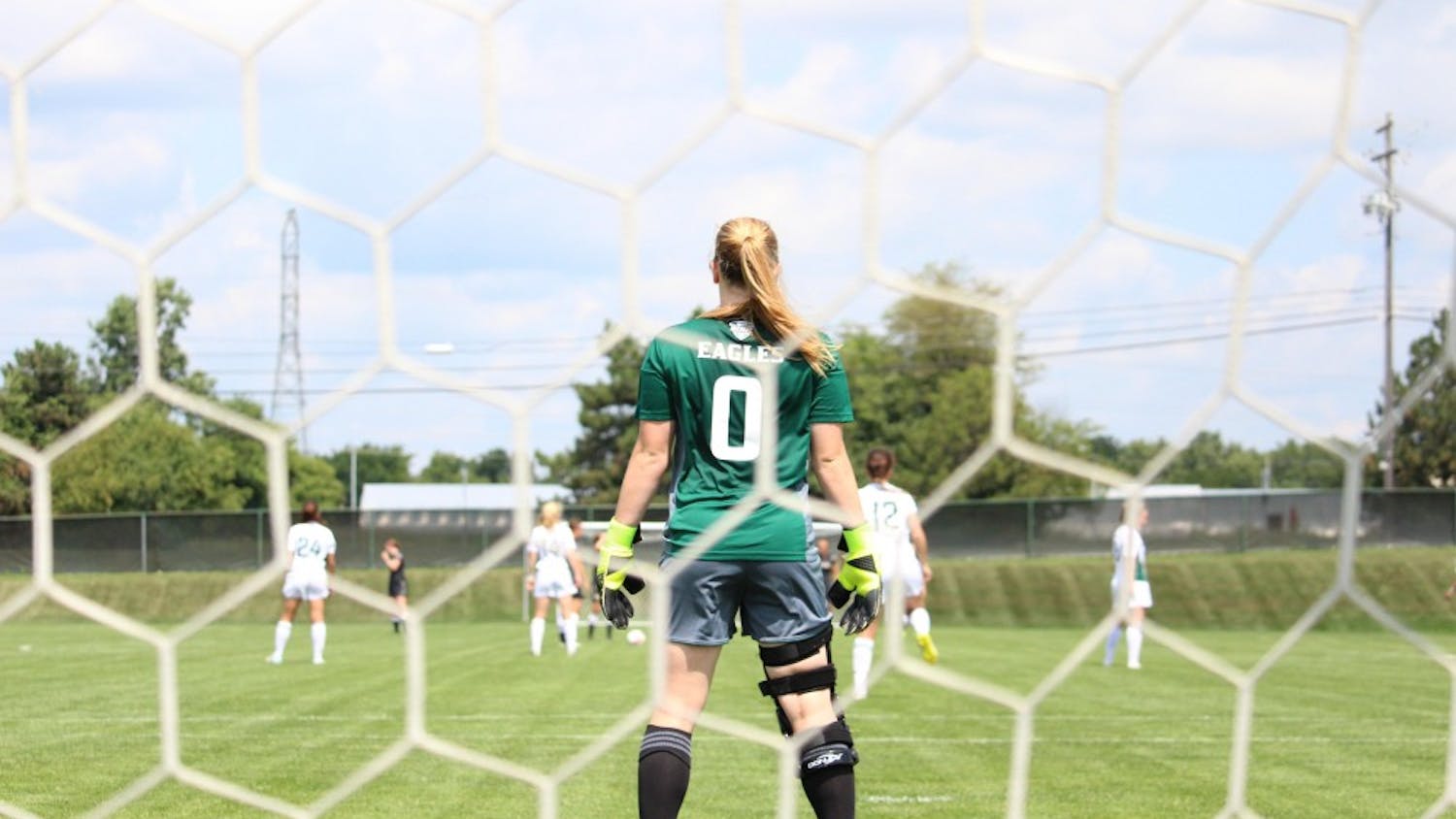 Senior goalkeeper Megan McCabe looks over the field as her team gets ready to kick-off.