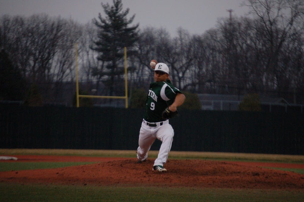 EMU pitcher Kristian Calibuso begins his delivery of a pitch in Eastern Michigan’s 15-9 win over Siena Heights Thurs. Apr. 10.