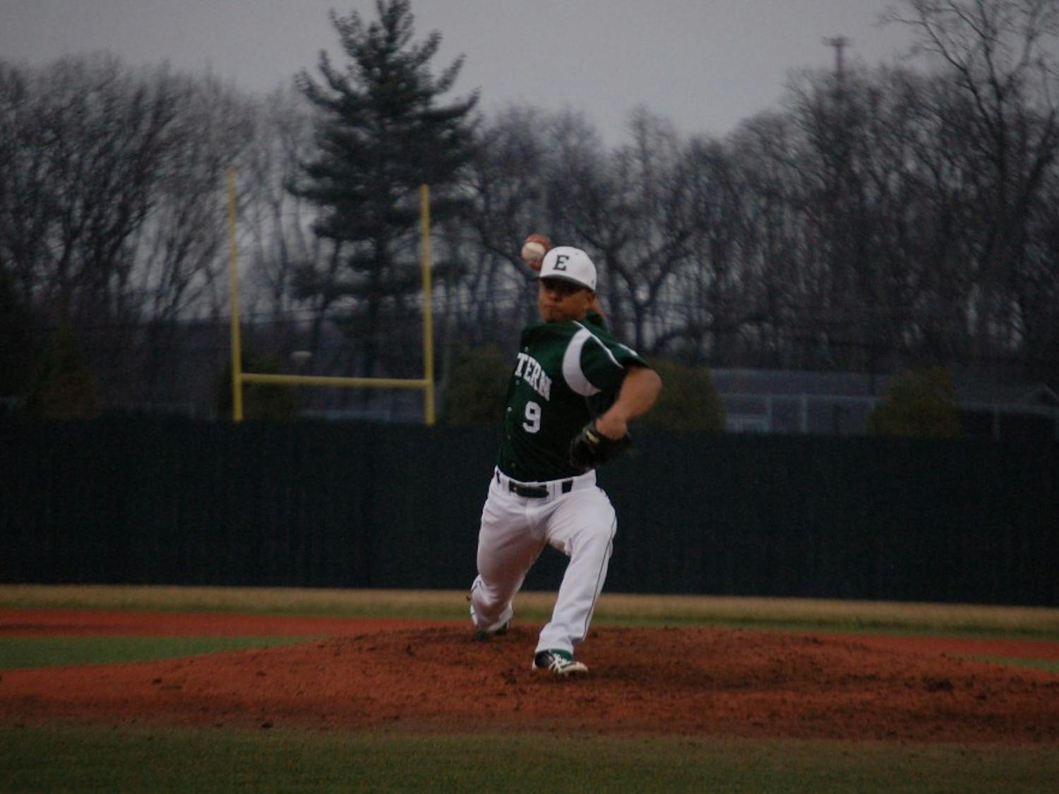 EMU pitcher Kristian Calibuso begins his delivery of a pitch in Eastern Michigan’s 15-9 win over Siena Heights Thurs. Apr. 10.