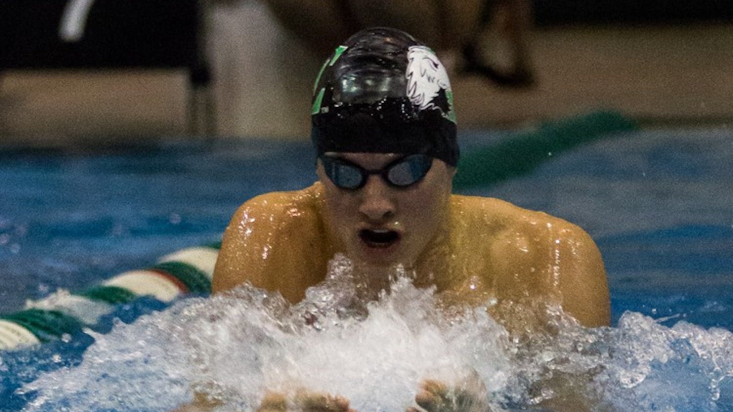 Junior Mike Fisher (Saline, MI) won the 200 yard breaststroke (2:04.75) by 1.5 seconds.