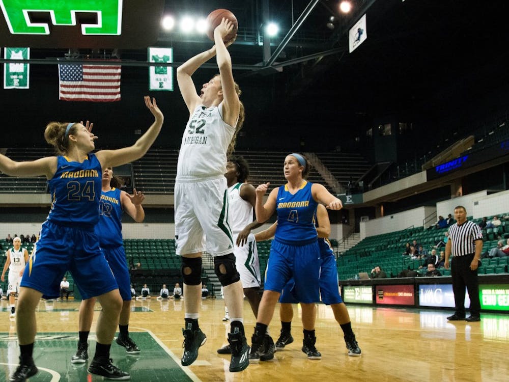 Rachel Kehoe executes her jump shot at the EMU vs. Madonna basketball game on Tuesday, December 9th 2014 at the Convocation Center