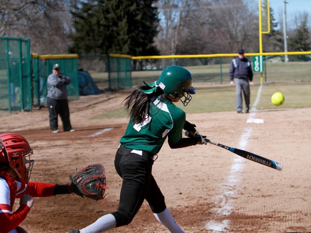 Abby Davidson hits the ball in the Eagles 9-7 loss to Miami (OH) in Ypsilanti on Saturday,
March 28, 2015.arch 28, 2015.