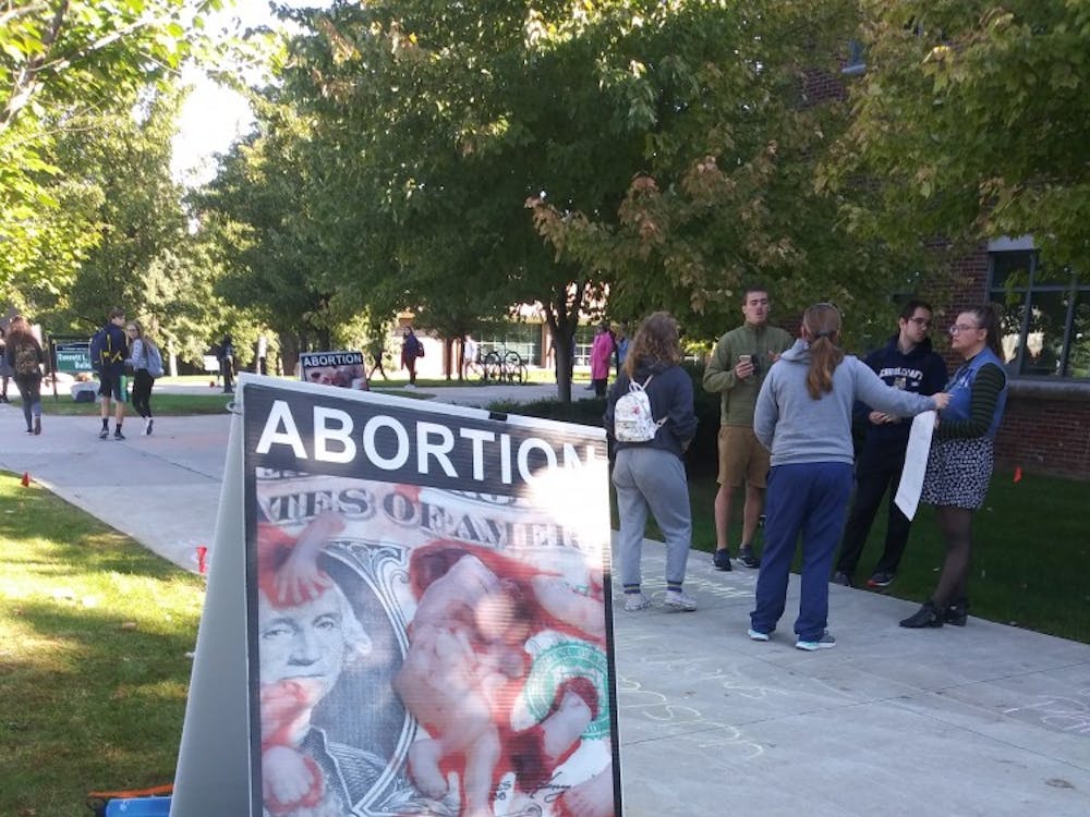 A pro-life poster displayed at the Created Equal abortion display.