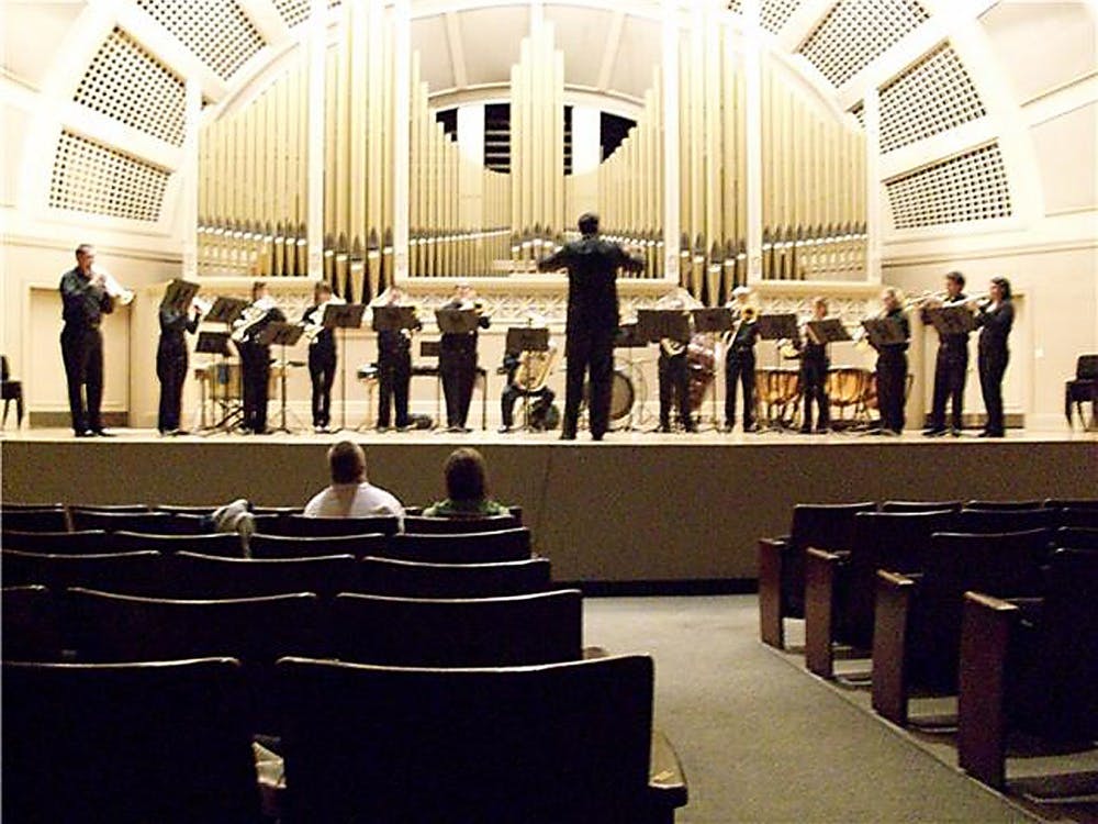 	EMU’s Wind Symphony, directed by Dr. Mary Schneider, performed at Pease Auditorium on Friday. Composers played included Antonin Dvorak and Alfred Uhl.