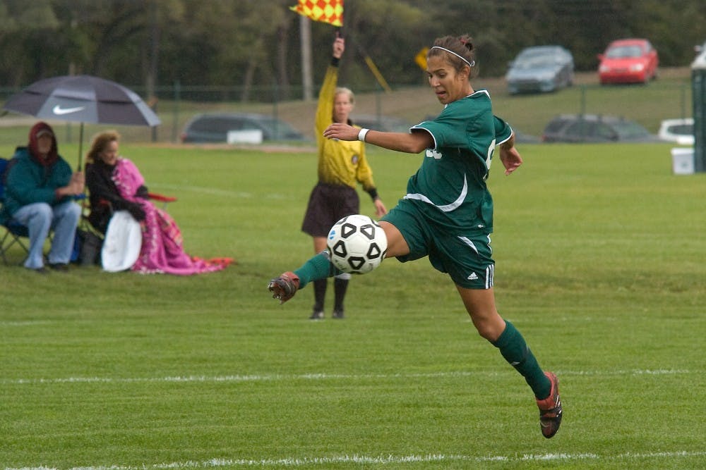Ashley Rodrigues (99) kicks the ball Sunday to a fellow teammate in a chance for an Eastern Michigan goal.