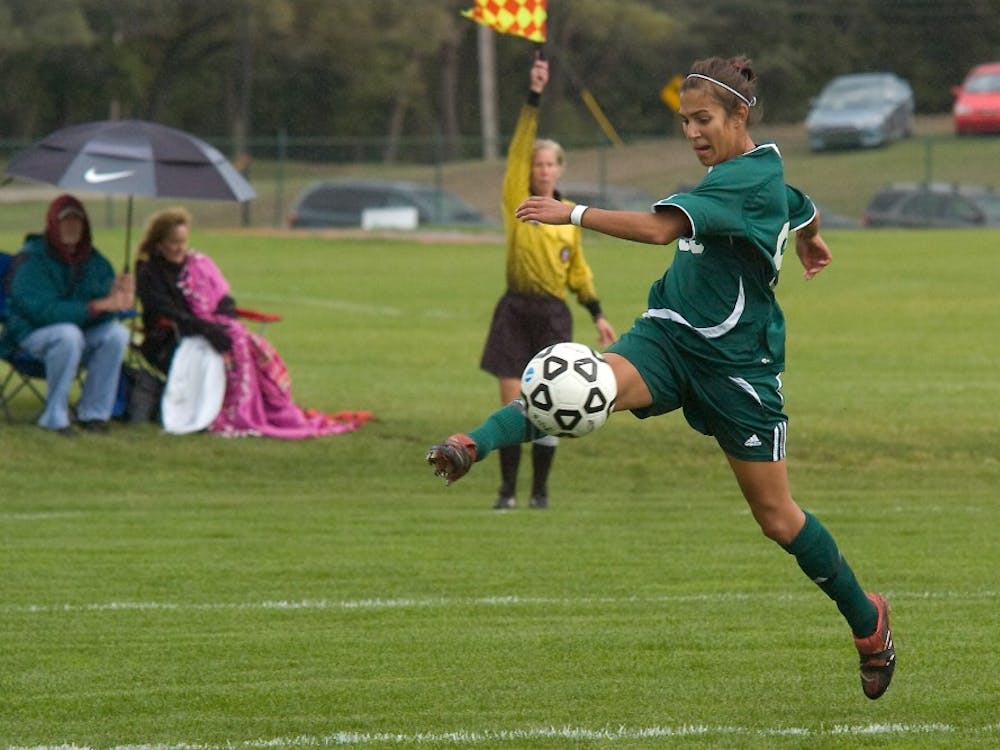 Ashley Rodrigues (99) kicks the ball Sunday to a fellow teammate in a chance for an Eastern Michigan goal.