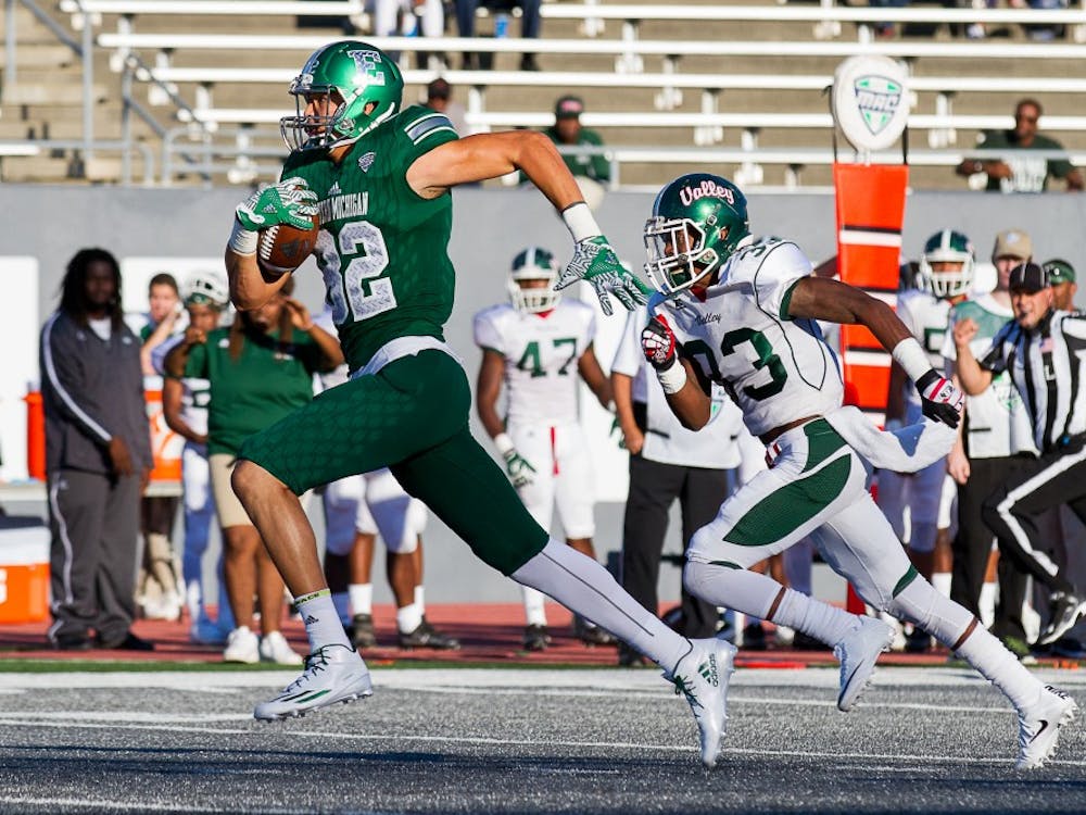 Eastern Michigan tight end runs past a defender during the Eagles’ 61-14 win on Sept. 2.