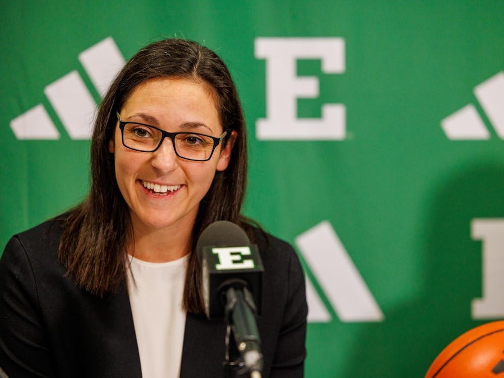 New Eastern Michigan University women's basketball head coach Sahar Nusseibeh cracks a smile at her introductory press conference. 