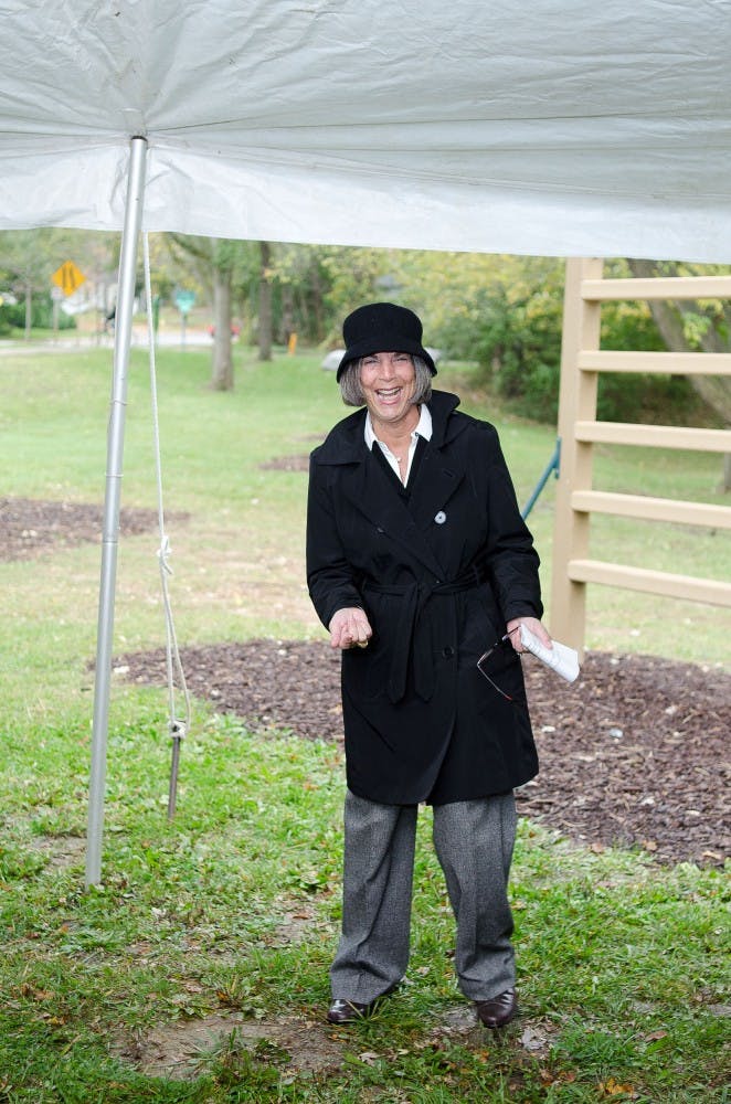 Ellen Gold, Executive Director of Student Well Being, welcomes attendants at the grand opening of the outdoor fitness recreation area.  