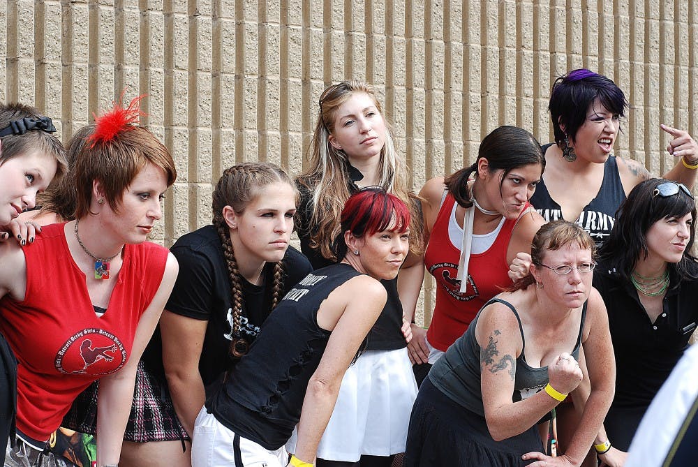 	The Detroit Derby Girls pose for a photo outside of the Bonaventure Skating Rink during a promotion the new movie “Whip It”.