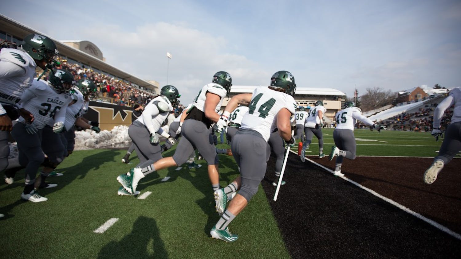 The Eastern Michigan football team takes the field in the Eagles 51-7 loss to Western Michigan Saturday afternoon in Kalamazoo.