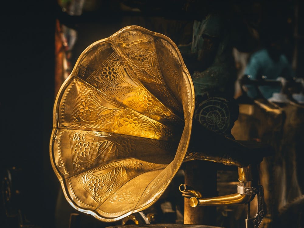 An antique gramophone, the iconic symbol of the Grammy Awards. Photo by Sudhith Xavier on Unsplash.