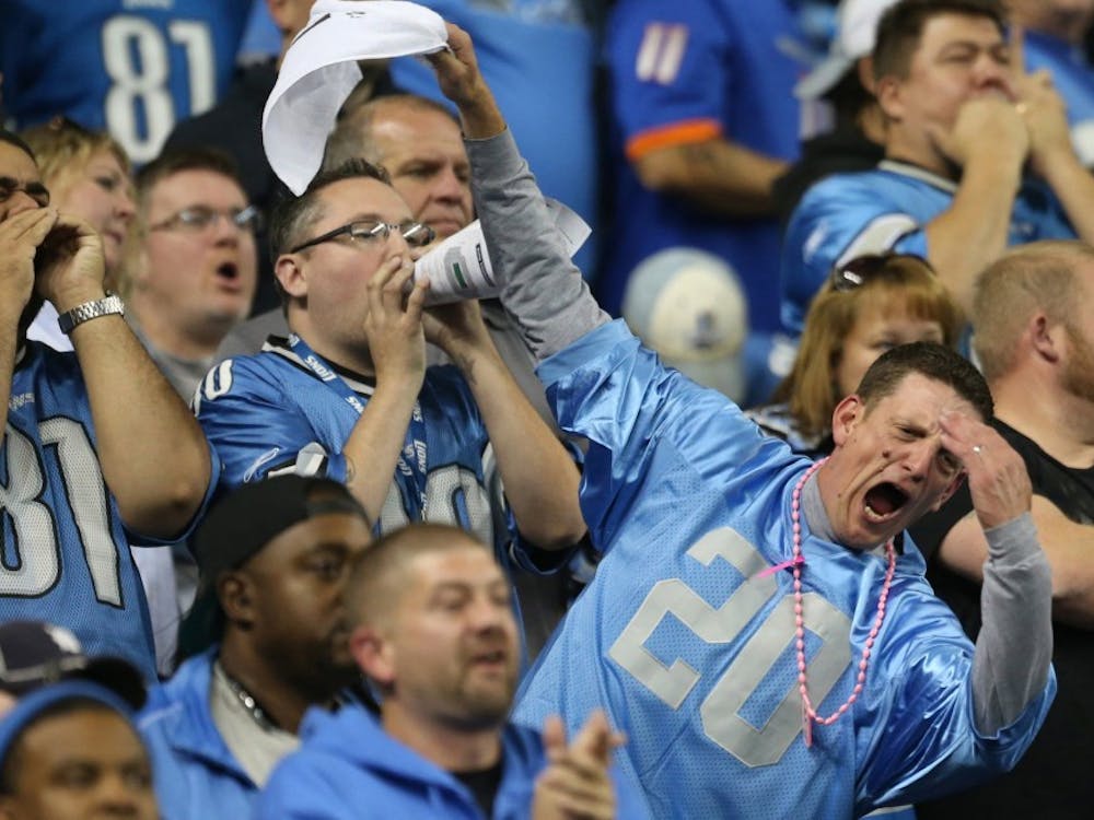 Detroit Lions fans react after the missed field goal by Alex Henery during fourth quarter action against the Buffalo Bills  at Ford Field in Detroit Sunday, October 5, 2014. (Kirthmon F. Dozier/Detroit Free Press/MCT) 