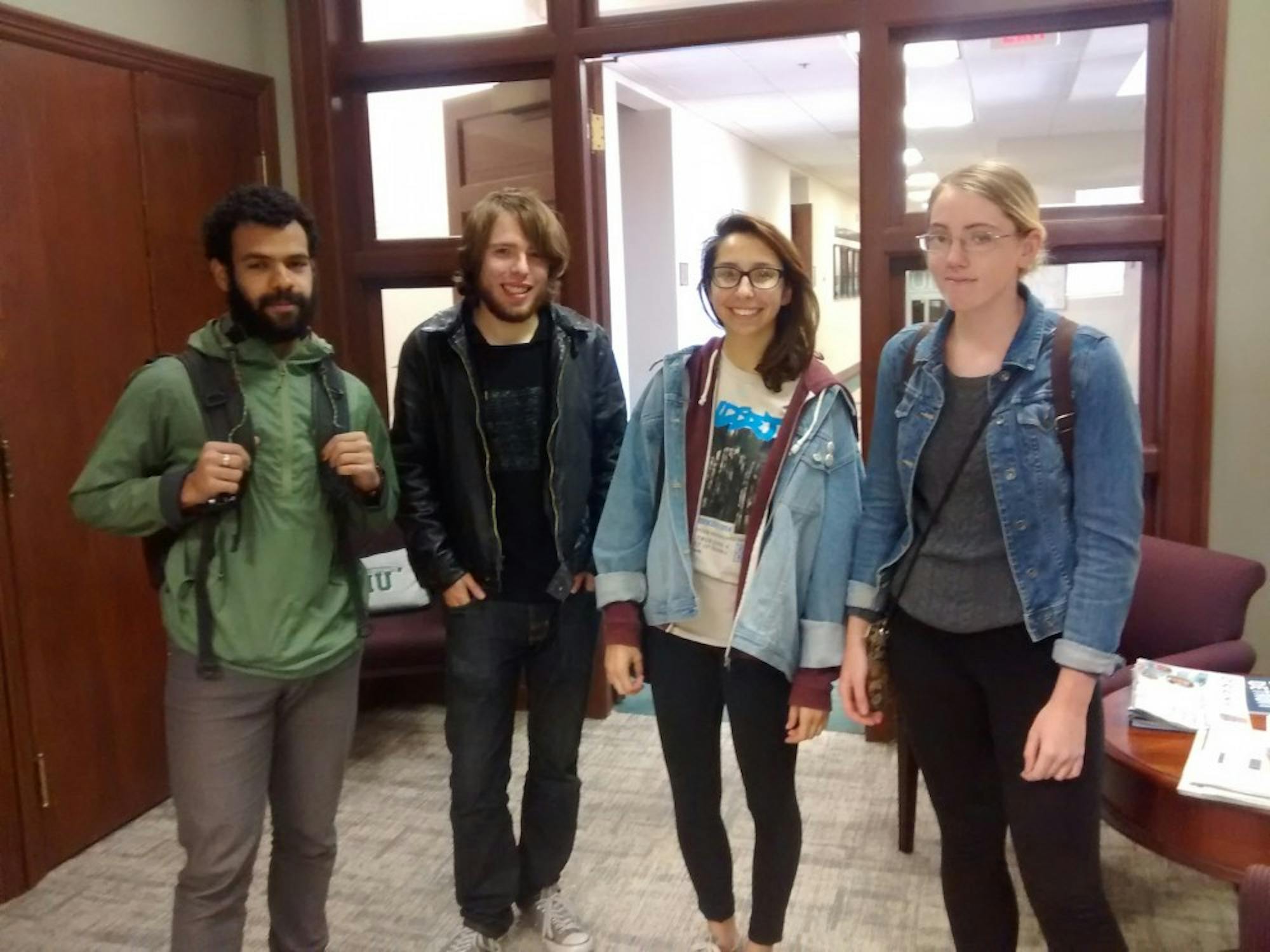 From left to right, Samir Webster, Jake Maynard, Gabriella Arkelian and Emily Hoepner, from Students for an Ethical and Participatory Education,&nbsp;delivered their letter to interim president, provost and executive vice president&nbsp;Kim Schatzel.