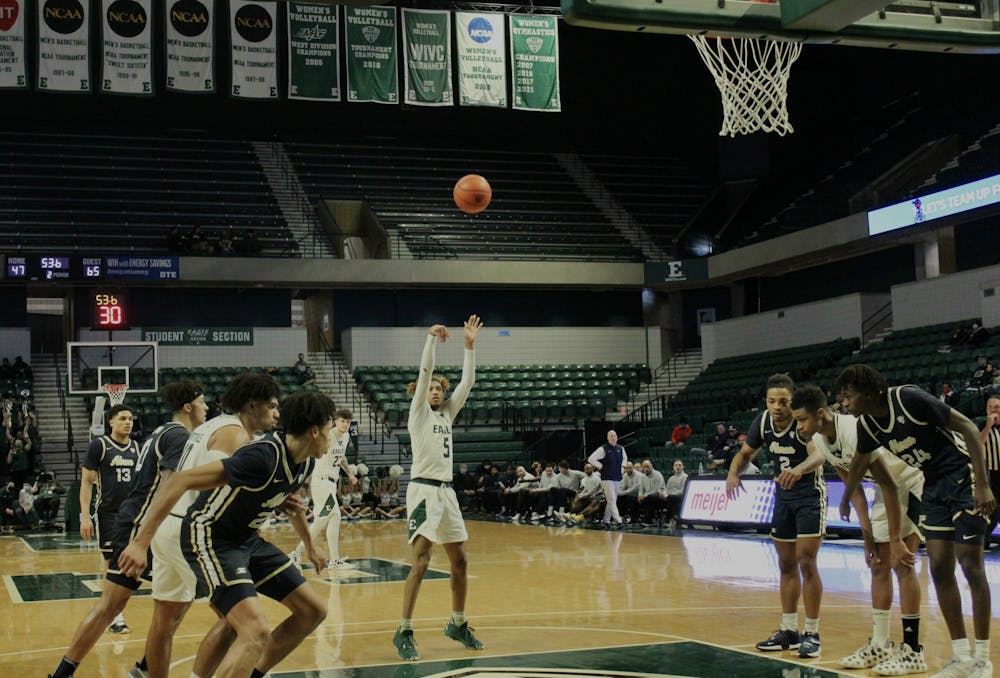 EMU mens' basketball claw their way to victory over the Northern Illinois Huskies, 74-72 