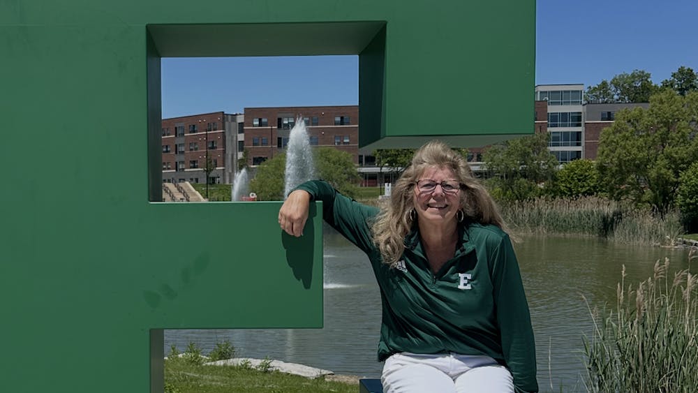 Meg Castro sits on the block E on campus.