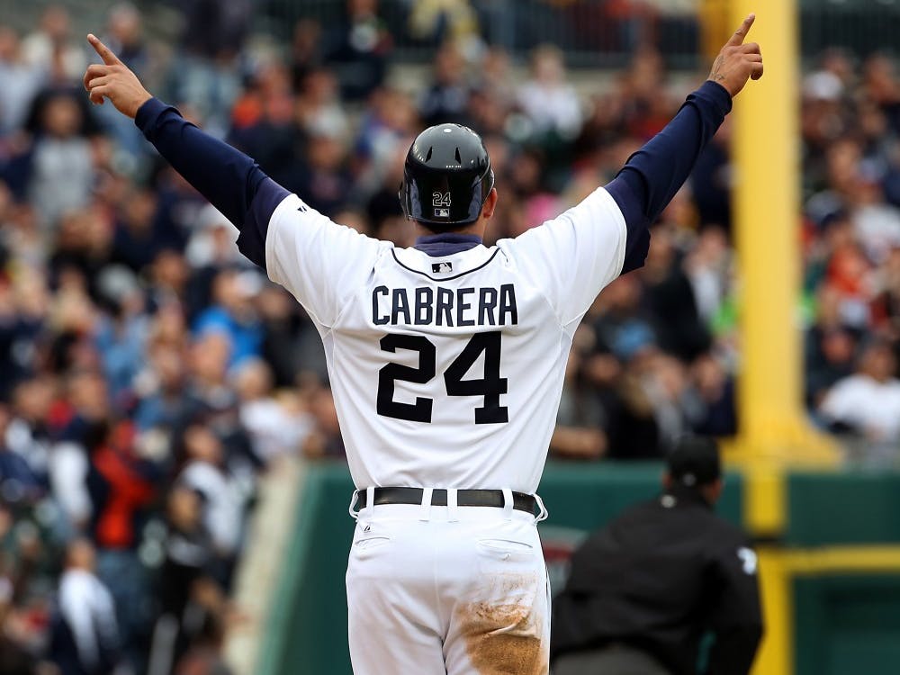 The Detroit Tigers' Miguel Cabrera, celebrating a home run on September 22, 2012, is the American League's first Triple Crown winner in 45 years and he captured the league's MVP trophy on Thursday, November 15, 2012. (Diane Weiss/Detroit Free Press/MCT)