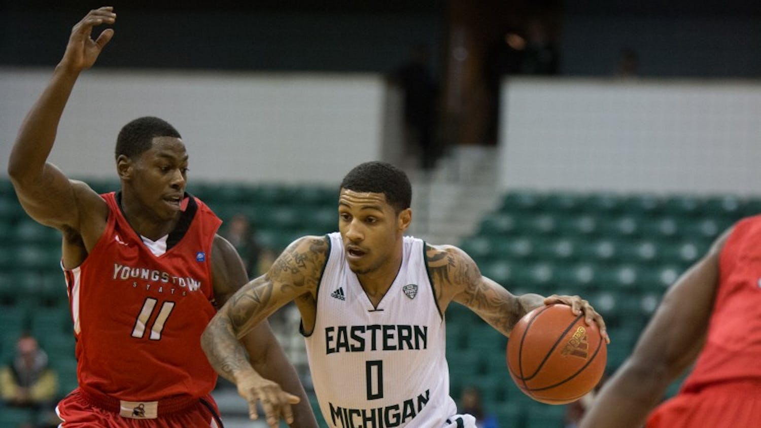 Eastern Michigan guard Ray Lee drives past the defender in the Eagles 71-62 win over Youngstown State Friday night in Ypsilanti.
