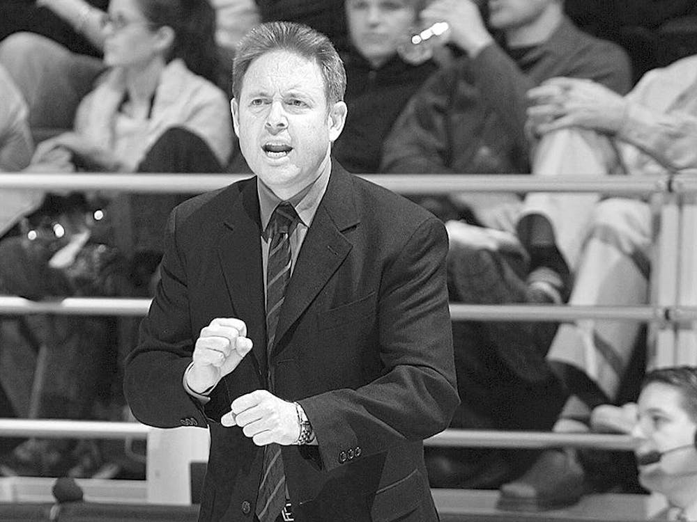 Former men's basketball coach Ben Braun shouts instructions from the sidelines during a game at Eastern Michigan University. Braun's 11-year tenure at EMU included leading the team to three NCAA tournament appearances.
