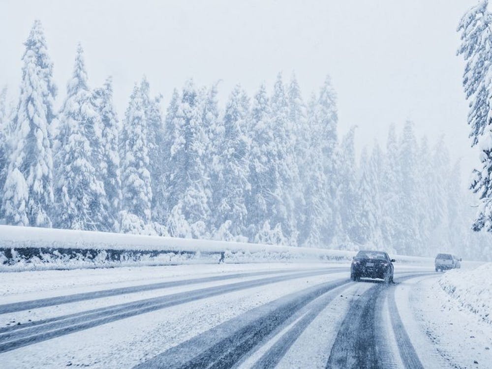 cars-driving-on-snowy-remote-road-royalty-free-image-1605892727_.jpg