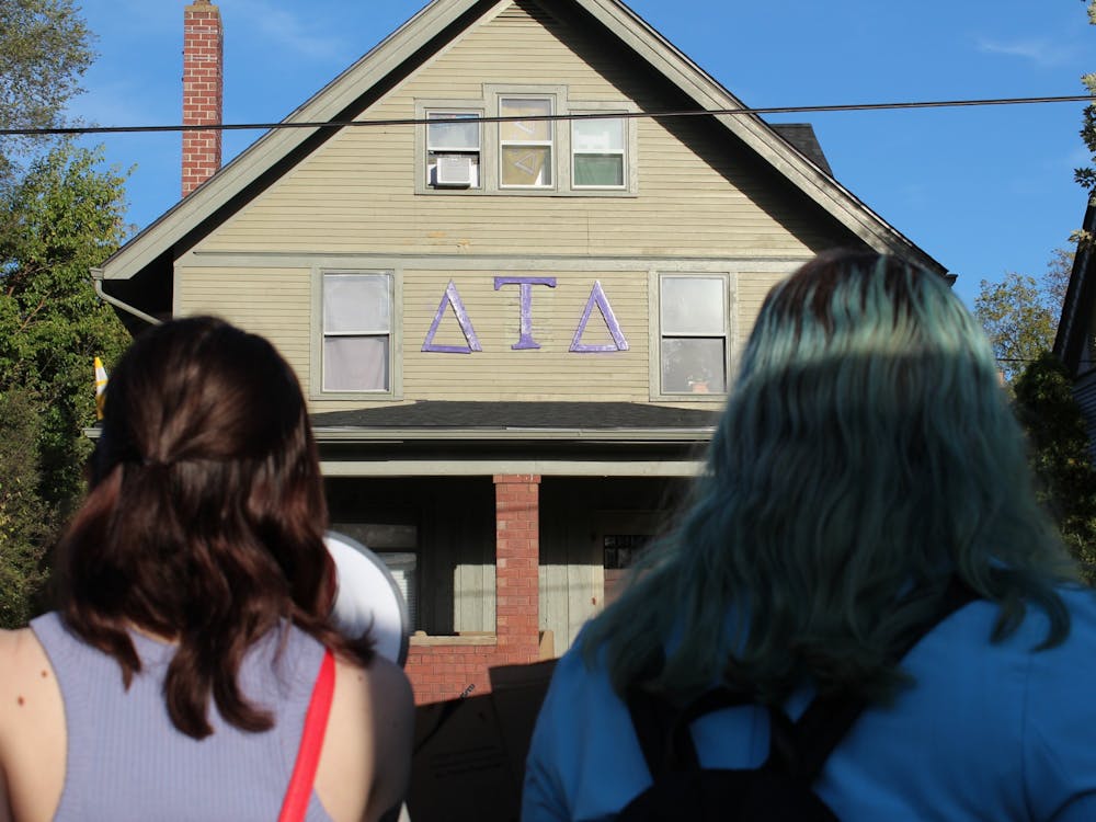 Eastern Michigan University students protest outside Delta Tau Delta on Oct. 19. 