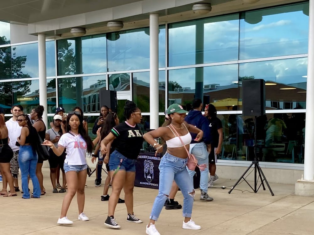 Eastern Michigan sororities enjoy the on-campus DJ at EagleFest outside of Eastern&#x27;s Student Union, Tuesday, Aug. 31, 2021.  