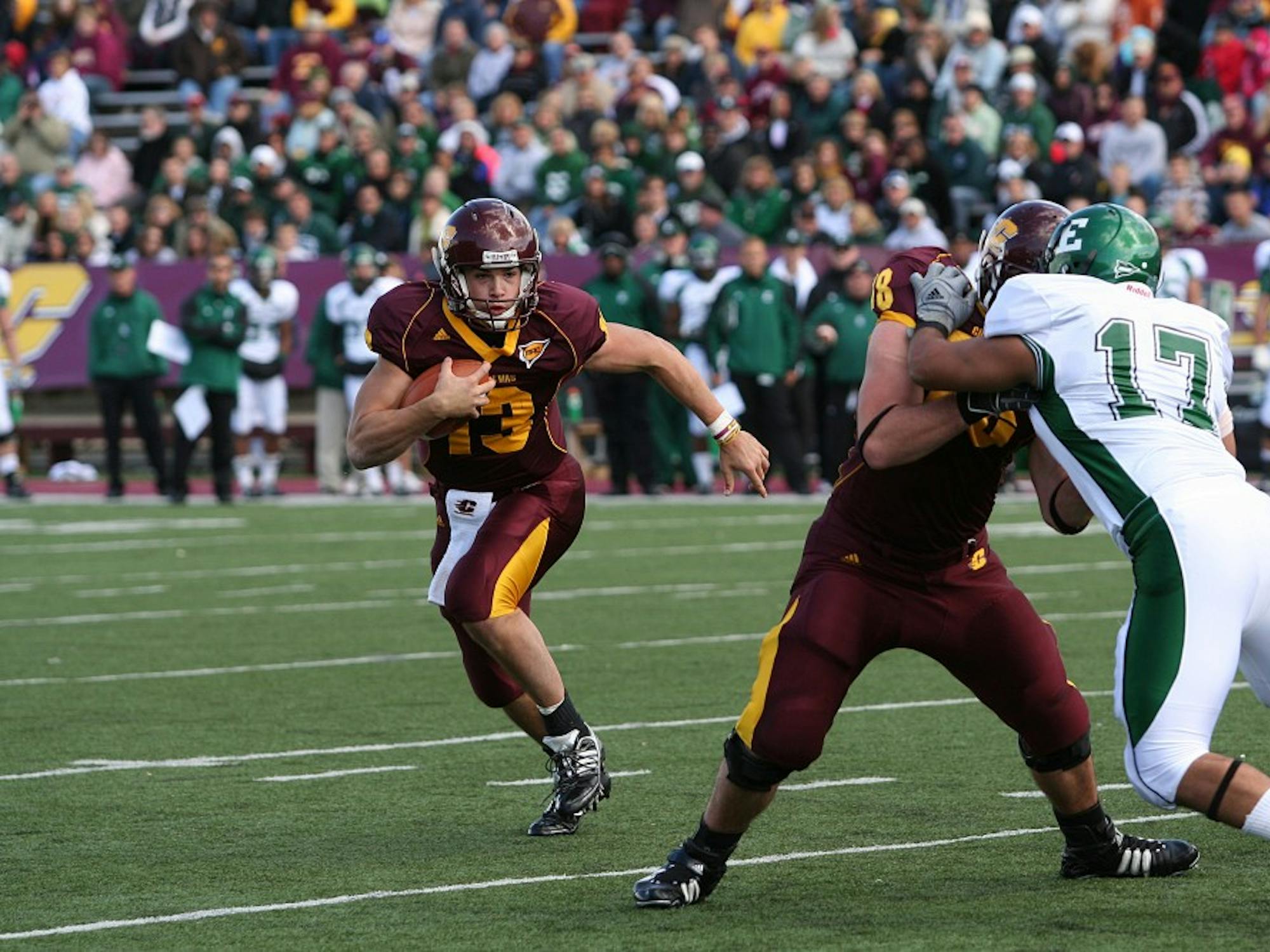 Dan LeFevour (13) in Central Michigan’s 56-8 win over Eastern Michigan on Saturday. He tied a career high with six touchdowns (3 passing, 3 rushing).