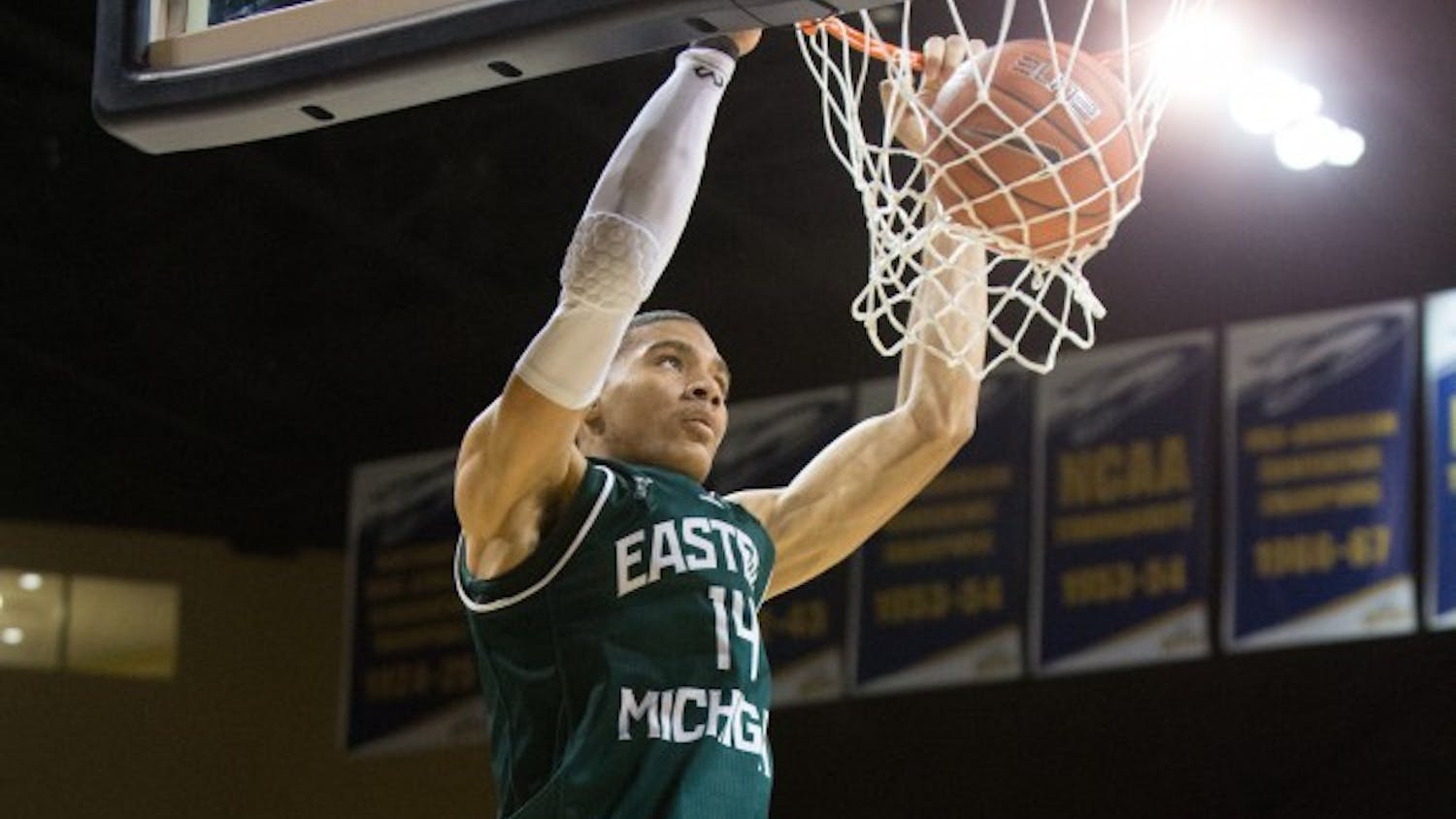 Eastern Michigan forward Karrington Ward (14) puts down the two handed dunk in the Eagles 77-66 loss to Toledo Saturday afternoon.