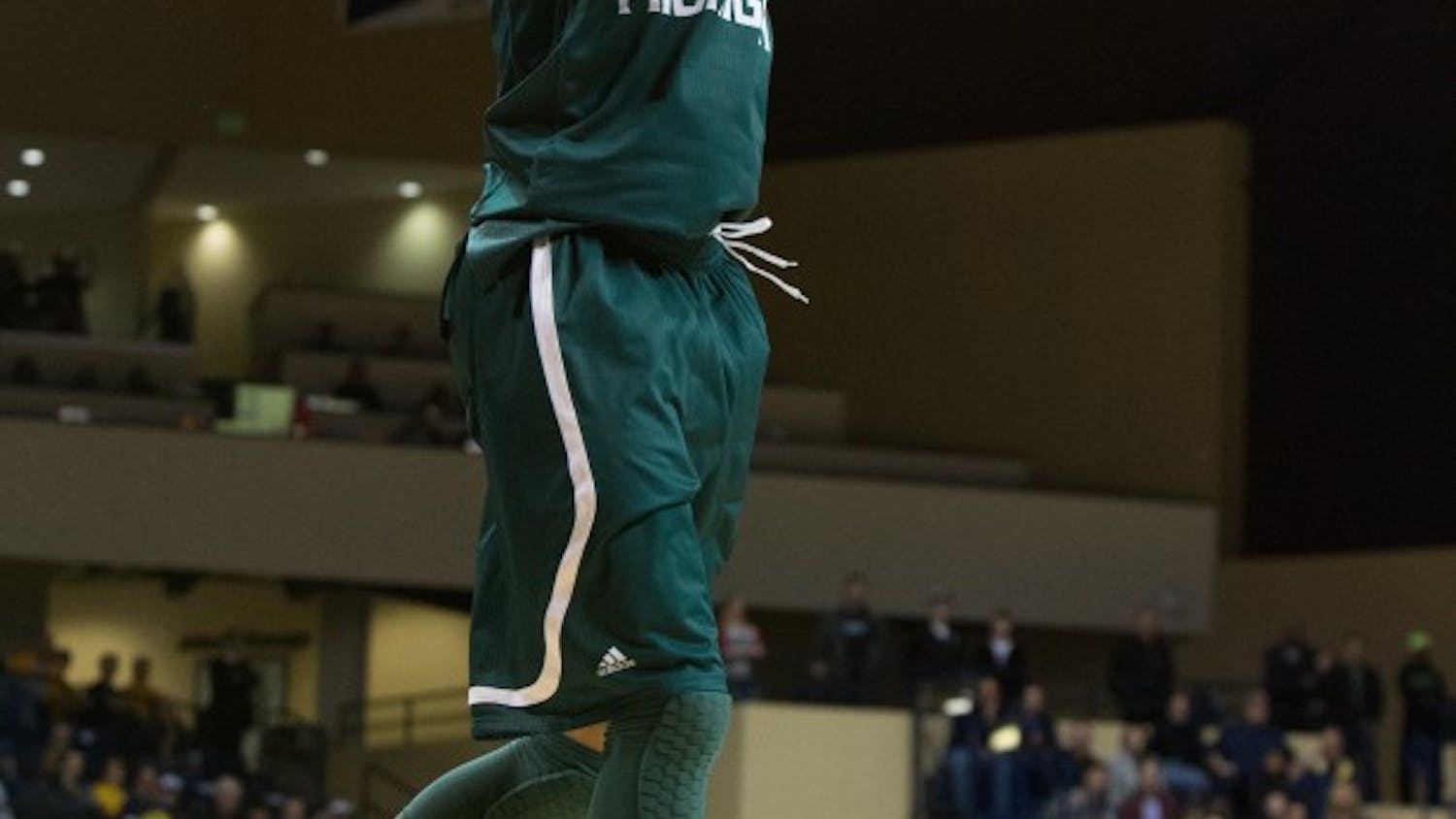 Eastern Michigan forward Karrington Ward (14) puts down the two handed dunk  in the Eagles 77-66 loss to Toledo Saturday afternoon.