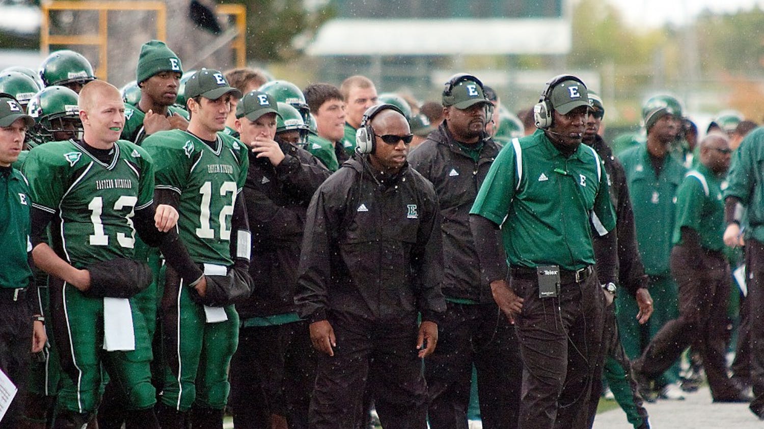 Ron English (far right) looks from the sideline in EMU’s loss Saturday. His defense allowed 365 yards.