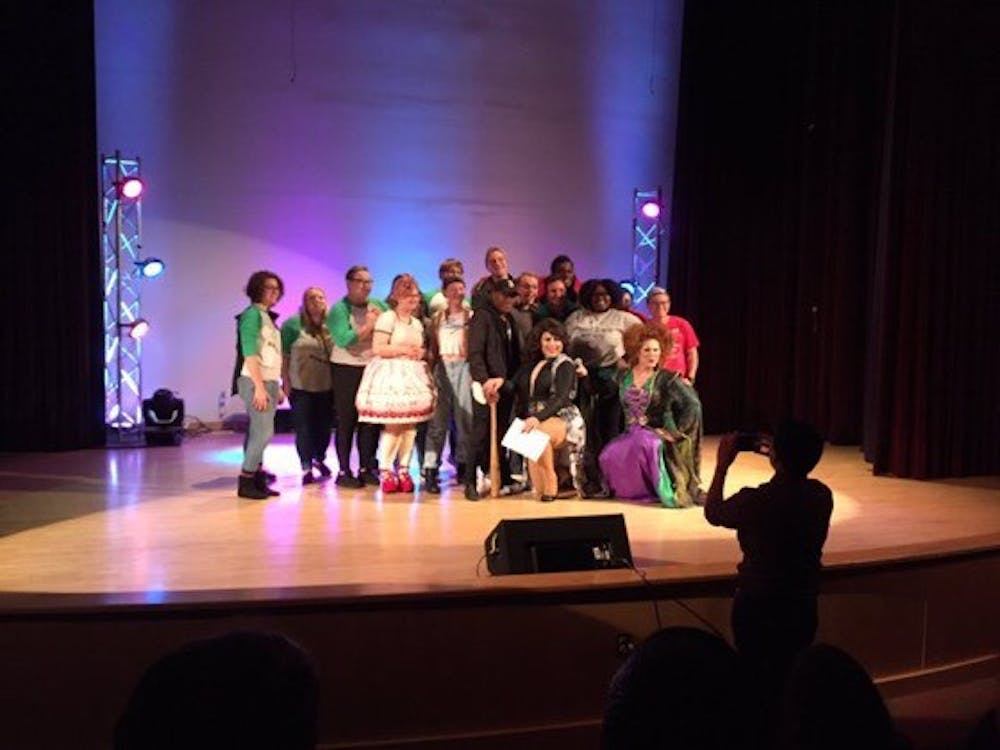 Audience Cheers as Drag Queens and Students Perform at the Rainbow Variety Show